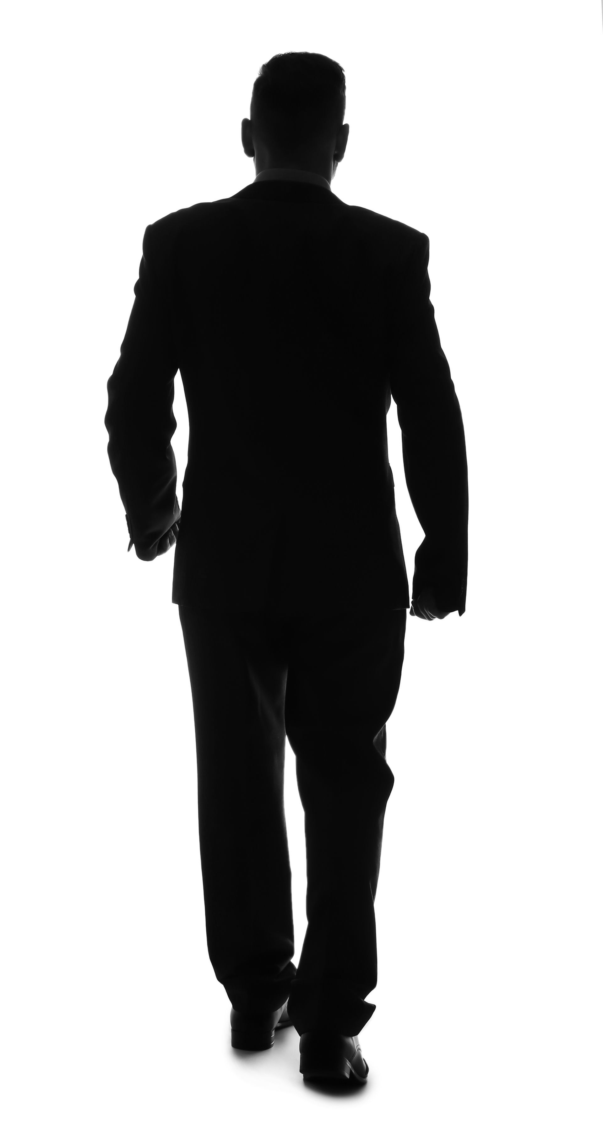 Silhouette of businessman on white background, back view